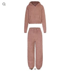 SKIMS cozy knit zipper hoodie and jogger set in rose clay